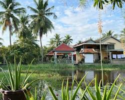 A welcoming Cambodian host family in their home.