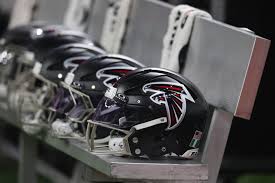 Falcons are gathering information about allegations against assistant coach LaTroy Lewis