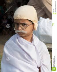 Abhay Ghat, Sabarmati Ashram, Ahmedabad, India on 2nd October, 2012 - Young boy standing for count and dressed up as Gandhi for world record of 1000 Gandhi ... - young-boy-standing-dressed-up-as-gandhi-world-record-29677225