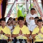 After rescue, soccer boys pray