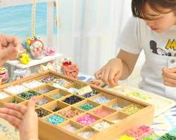 person holding an Okinawa souvenir accessoryの画像