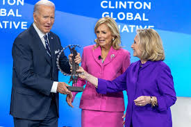 Joe Biden tells Hillary Clinton 'I love you' after being 'trapped' by wife 
Jill into giving NYC speech