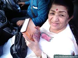 Famous Indian Singer Lata Mageshkar receives Bhagavad Gita. Posted in Book Distribution To Important Peoples. Famous Indian Singer Lata Mageshkar receives ... - Famous-Indian-Singer-Lata-Mageshkar-receives-Bhagavad-Gita