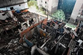 Possible gas explosion and fire in Sao Paulo kills one, damages homes