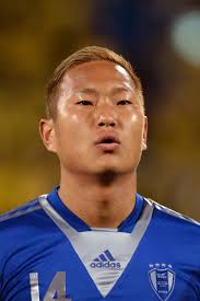 In This Photo: Chong Tese, Hidekazu Otani. Chong Tese #14 of Suwon Bluewings looks on prior to the AFC Champions League Group H match between Kashiwa Reysol ... - Chong%2BTese%2BKashiwa%2BReysol%2Bv%2BSuwon%2BBluewing%2BGOs7myczHuyl