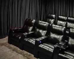 Image of blackout curtains in a home theater