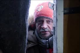 Let me in! Dmitry Kulik from Tyumen, the expedition&#39;s organiser, is pictured during the very first days of the journey. Picture: Irina Moroz - inside%2520-%2520let%2520me%2520in