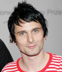 Matt Bellamy then brings in a different view on the matter saying - matt-bellamy-red-and-white-stripey-top