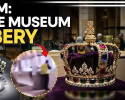 صورة Louvre Museum jewelry theft heist scene security footage concept