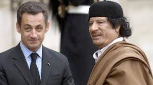 Image result for hillary clinton with gaddafi son