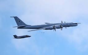Russian planes drop trackers near Britain’s flagship carrier