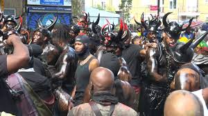 Revellers don oil and paint for opening ceremony of Notting Hill carnival