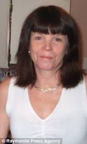 Victim: Grandmother Susie Southern, 53, who died in an arson attack on her Nottingham home as her husband battled in vain to save her - article-1242919-07D88E59000005DC-674_233x384