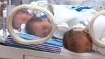  Triple the love! Long Island couple welcomes two girls and a boy
