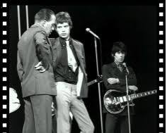 Ed Sullivan Show 19481971 television stills Ed Sullivan hosting The Beatles Elvis Presley Topo Gigio variety show black and white photos, AI generated