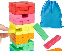 Image of toddler building a tower with wooden blocks