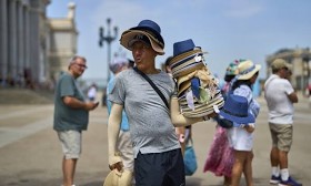 Europe sizzles and the Eiffel Tower’s summit closes