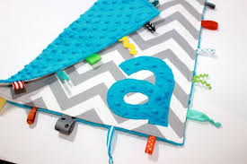 Résultat de recherche d'images pour "taggy blanket"