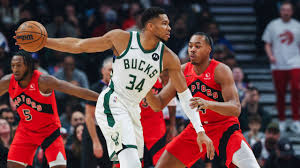 Giannis Dominates as Bucks Silence Raptors in Home Opener Thriller