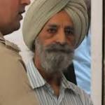 76-year-old convicted killer slits wife's