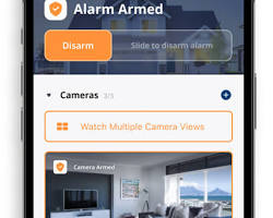 Изображение: AIpowered security system detecting a potential intruder and sending an alert to the homeowner's smartphone