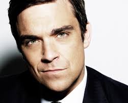 Robbie Williams Suit Face Eyebrows Tie. Is this Robbie Williams the Musician? Share your thoughts on this image? - robbie-williams-suit-face-eyebrows-tie-554001360