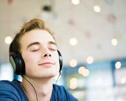 person listening to music with their eyes closed