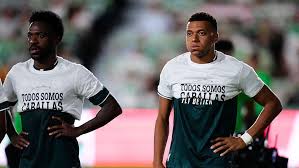 Kylian Mbappe and Real Madrid players during a pre-match Ceuta solidarity gesture