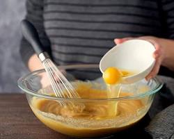 Image of Whisking peanut butter and egg in a bowl