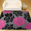 Black and pink area rug