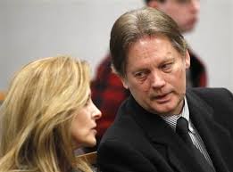 Keith Brown, right, talks to his sister-in-law before a hearing in Provo, Utah on Feb. 17. Brown, the father of the musical group &quot;The 5 Browns,&quot; pleaded ... - 110217-brown-110217-1201p.grid-6x2