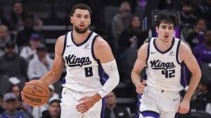 Sacramento Kings' Final Two Roster Spots: Elevate Jonathan Mogbo or Stay Flexible?