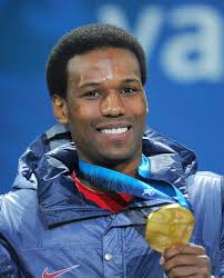 Shani Davis of United States celebrates winning the gold medal during the medal ceremony for the Men?s 1000m Speed Skating on day 7 ... - Vancouver%2BMedal%2BCeremony%2BDay%2B7%2BciMvJHfrnS3l