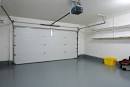 Installer une porte de garage sectionnelle -