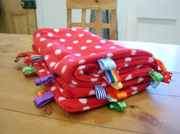 Résultat de recherche d'images pour "taggy blanket"