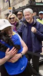 Chelsea Clinton celebrates finishing the Boston Marathon