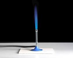 Image of Bunsen burner with blue flame chemistry lab