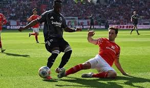 Eintracht Frankfurt Adjusts Lineup with Knauff, Hojlund Return for Cologne Match