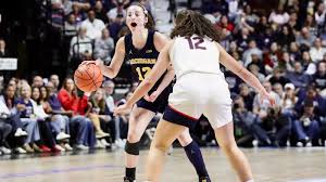 UConn Edges Michigan in Thrilling Basketball Hall of Fame Showcase