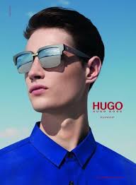 Styled by Tom Van Dorpe, Andrew fronts Hugo Boss&#39; spring/summer 2014 eyewear advertisement. Captured against a vibrant blue sky, Andrew sports the season&#39;s ... - hugo-boss-eyewear-spring-summer-2014-campaign-photo-002