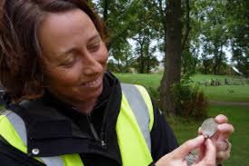 Sian Jones with coronation medallion. Led by University of Manchester archaeologists, the Heritage Lottery Fund supported dig aims to expose and explore the ... - 10330_large