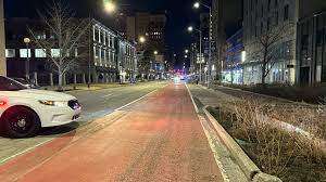 Man injured, 1 detained after shooting in downtown Indianapolis