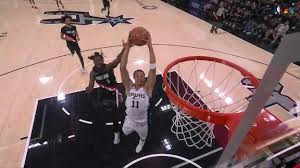 Carter Bryant throws down huge slam on Spurs fast break