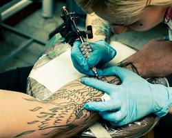 Image of someone getting a tattoo