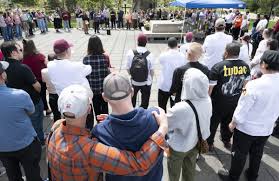 In silence and tears, a community remembers slain UMass worker at vigil