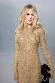 Nicole Kidman Parties in a Lace Bustier Crop Top and Unexpected Y2K-Coded Accessory