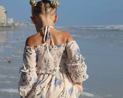Image of woman looking airy in the summer sun with a floral chiffon maxi dress