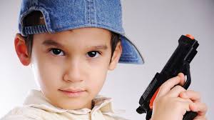 A young boy threateningly holds a toy gun. Photo: Shutterstock, all rights reserved. Topics: Arizona ♦ Arizona House of Representatives ♦ arizona senate - kidwithgun-shutterstock