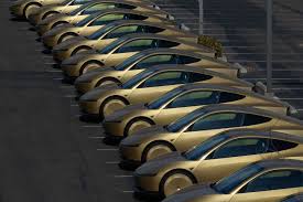 Tesla keeps hyping robotaxis as its future. But it’s trailing rival Waymo in a field yet to prove profitable