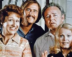 All in the Family 1971 TV series cast Carroll O'Connor as Archie Bunker Jean Stapleton as Edith Rob Reiner Sally Struthers 1970s CBS television stills living room chair, AI generated